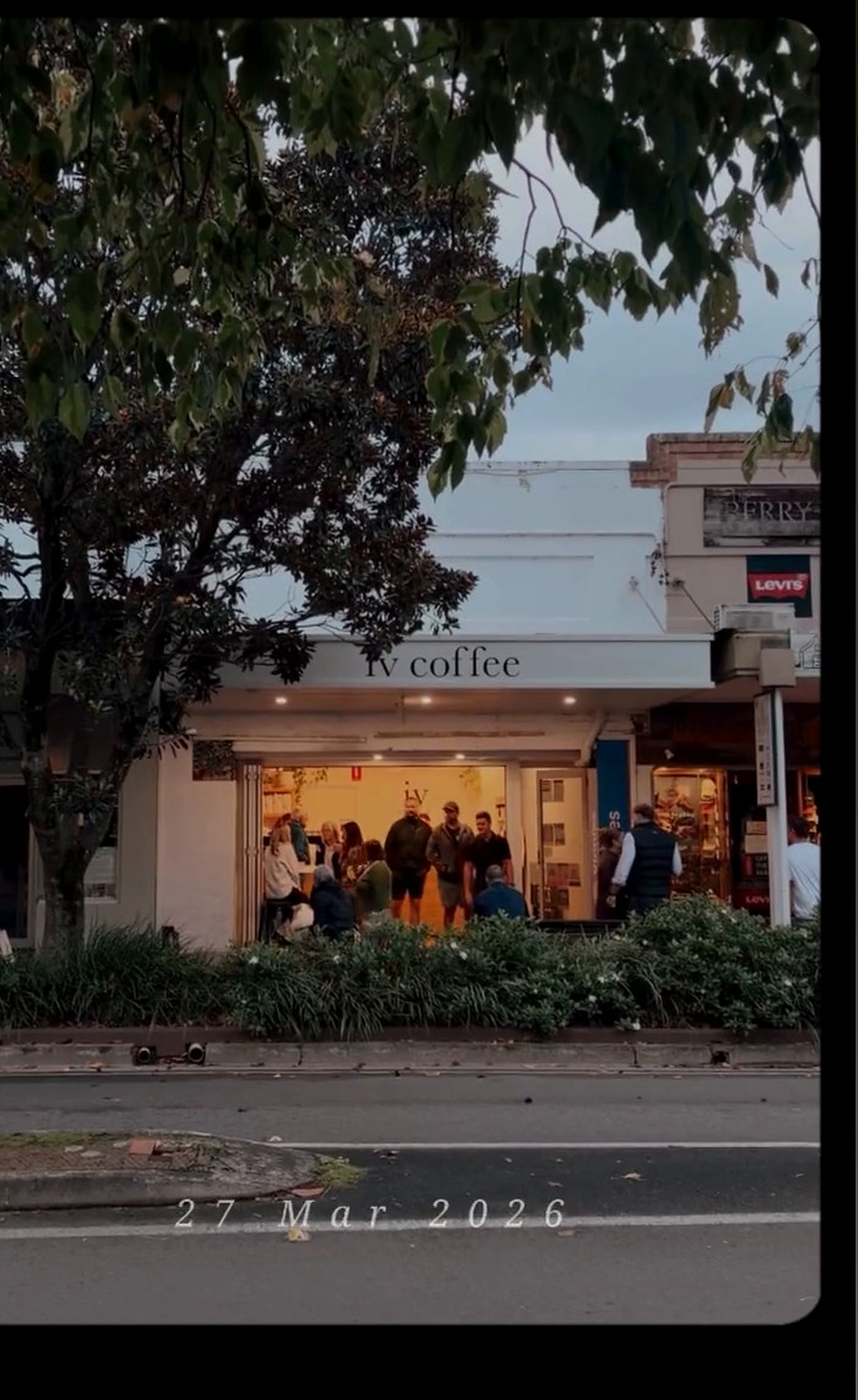 Evening crowd outside iv coffee, Berry